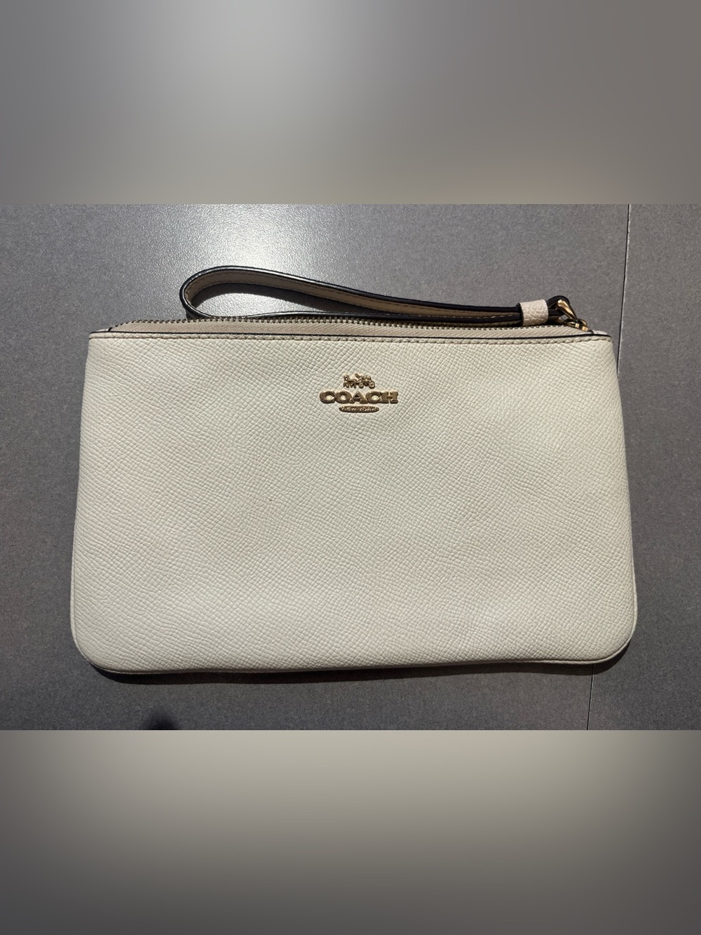 COACH Cream Pebbled Leather Wristlet Clutch with Gold Logo